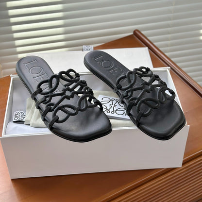 LOEWE - Petal Anagram slide in soft calfskin Noire